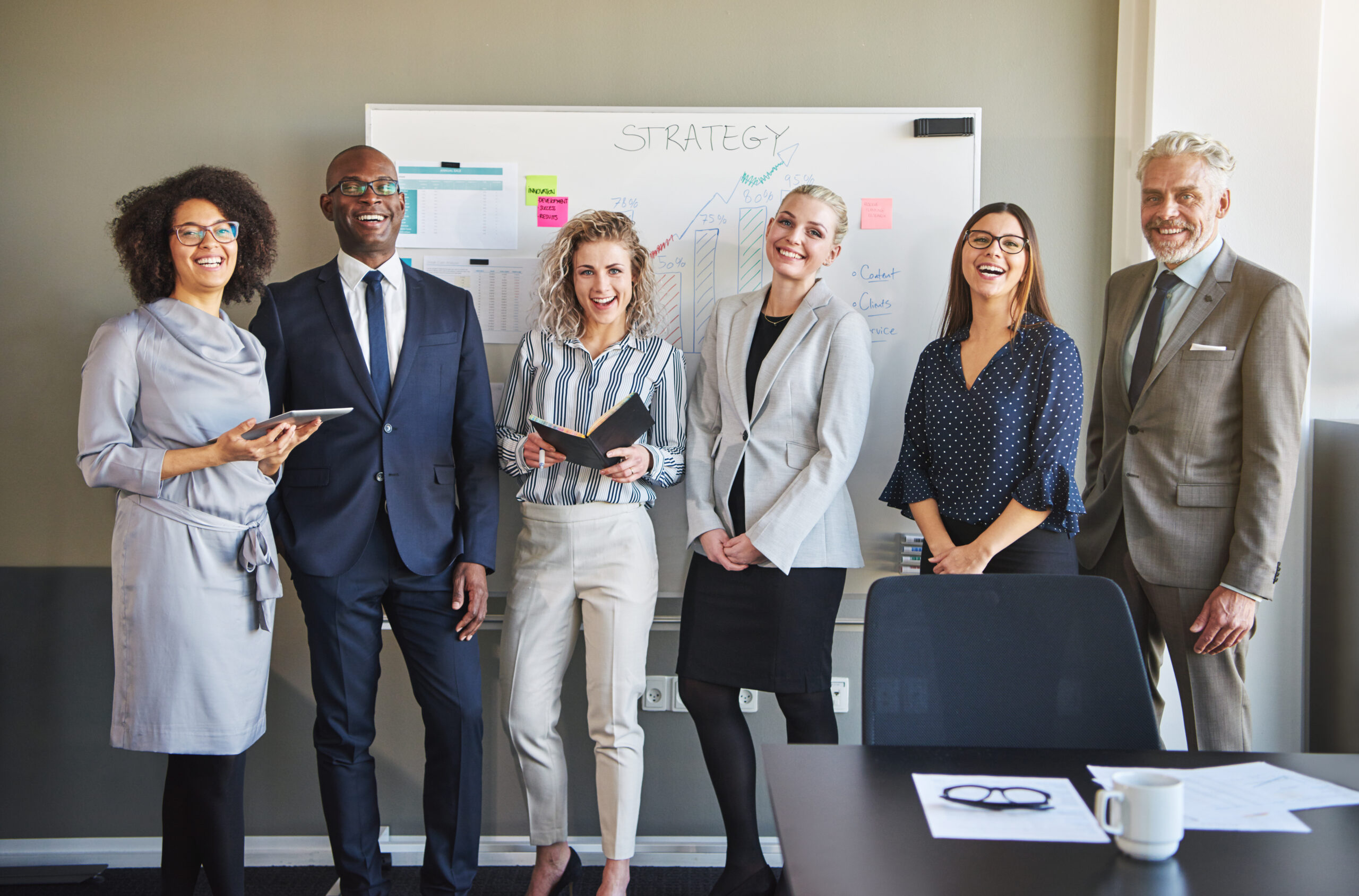 Team of business people looking at camera